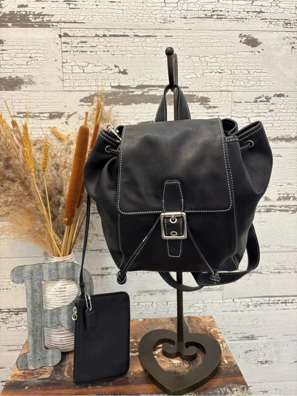 Coach Black Leather Drawstring Backpack with Silver Buckle